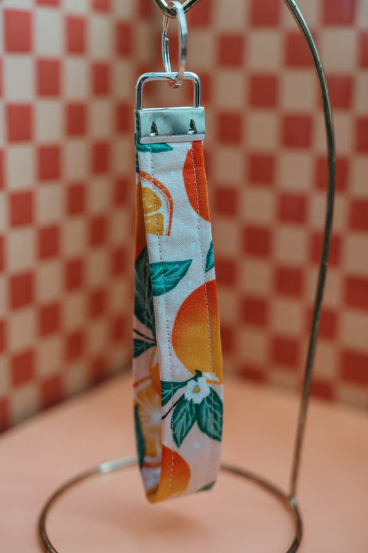 Orange and Leaf Wrist LanyardWebster Wax Company